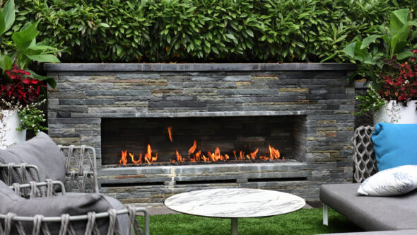 Blade fireplace with hand-chiseled flagstone